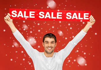 Image showing handsome man with sale sign