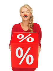 Image showing lovely woman in red dress with percent sign