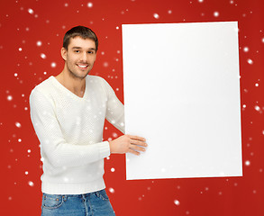 Image showing handsome man with big blank board