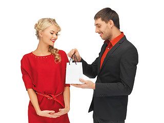 Image showing man and woman with present