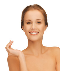 Image showing beautiful woman with moisturizing creme drop