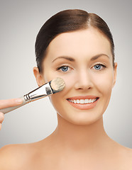 Image showing beautiful woman with brush