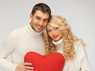 Image showing family couple in a sweaters with heart