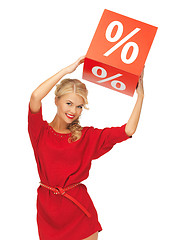 Image showing lovely woman in red dress with percent sign