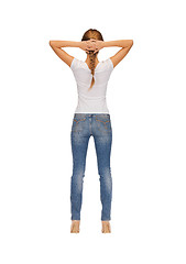 Image showing rear view of woman in blank white t-shirt