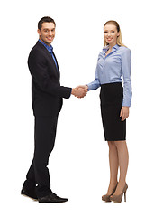 Image showing man and woman shaking their hands