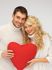 Image showing family couple in a sweaters with heart