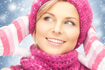 Image showing beautiful woman in hat, muffler and mittens