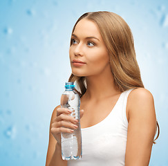 Image showing young beautiful woman with  bottle of water