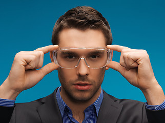 Image showing businessman in protective glasses