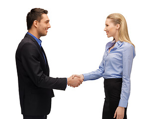 Image showing man and woman shaking their hands