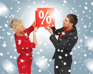 Image showing man and woman with percent sign