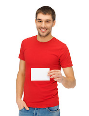 Image showing handsome man with note card