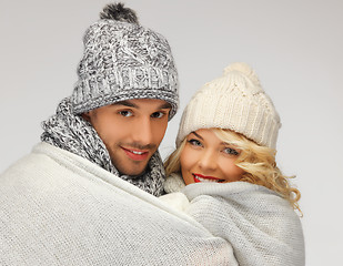 Image showing family couple under warm blanket