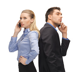Image showing man and woman with cell phones
