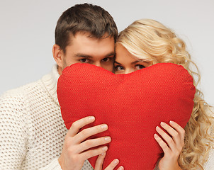 Image showing family couple in a sweaters with heart