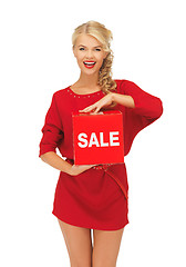 Image showing lovely woman in red dress with sale sign