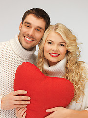 Image showing family couple in a sweaters with heart