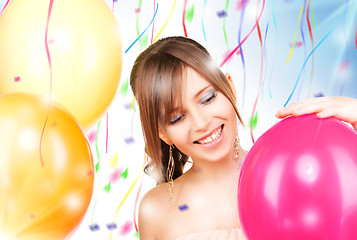 Image showing happy teenage girl with balloons