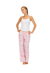 Image showing happy and smiling woman in cotton pajamas