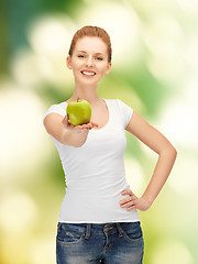 Image showing teenage girl with green apple