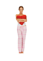 Image showing woman in cotton pajamas with big heart