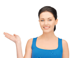 Image showing woman holding something on the palm