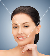 Image showing face and hands of beautiful woman