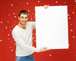 Image showing handsome man with big blank board