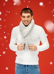 Image showing handsome man in warm sweater and scarf