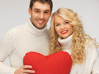 Image showing family couple in a sweaters with heart