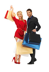 Image showing man and woman with shopping bags