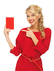 Image showing lovely woman in red dress with note card