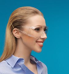 Image showing businesswoman in protective glasses