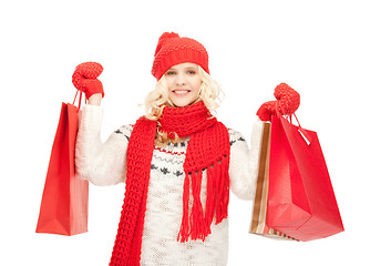 Image showing young girl with shopping bags