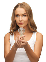 Image showing woman with energy saving bulb