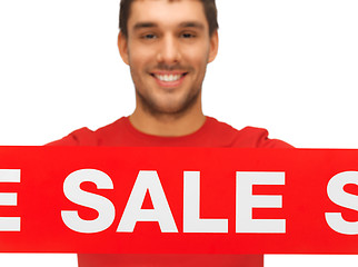 Image showing handsome man with sale sign