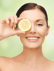 Image showing woman with lemon slice