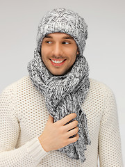 Image showing handsome man in warm sweater, hat and scarf