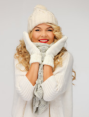 Image showing beautiful woman in hat, muffler and mittens