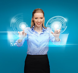 Image showing woman working with virtual screens