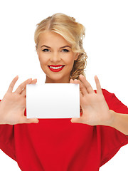 Image showing lovely woman in red dress with note card