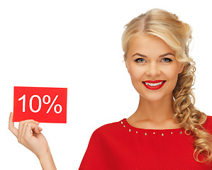 Image showing lovely woman in red dress with discount card