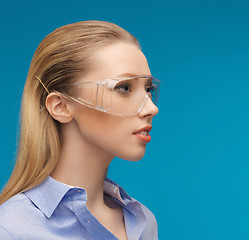 Image showing businesswoman in protective glasses