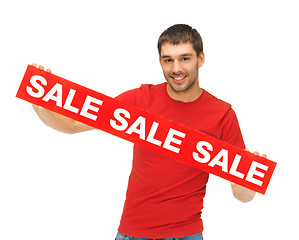 Image showing handsome man with sale sign