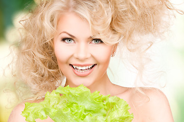 Image showing happy woman with lettuce