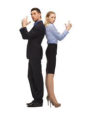 Image showing man and woman making a gun gesture