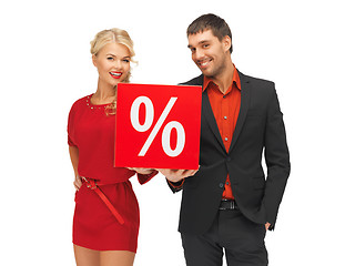 Image showing man and woman with percent sign