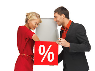 Image showing man and woman with percent sign