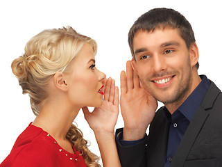 Image showing man and woman spreading gossip